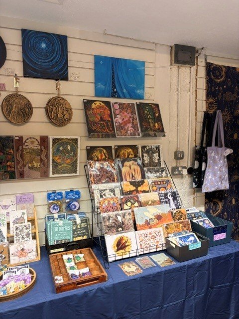 Art prints and illustrated cards inside the shop