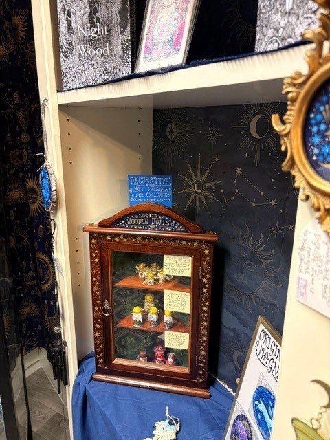 Celestial shop window decorated with a golden moon