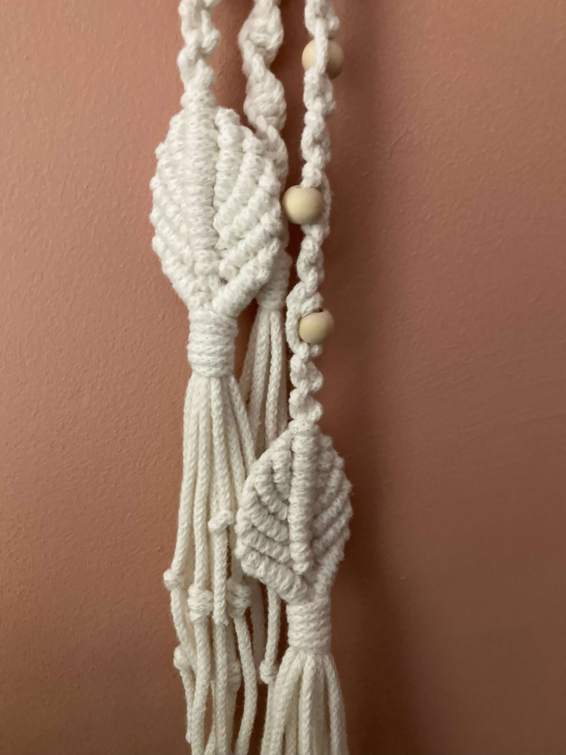 Handmade macrame wall hanging/decoration in white cord. 